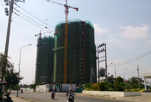 Làn sóng giảm giá địa ốc lan rộng ở TP HCM